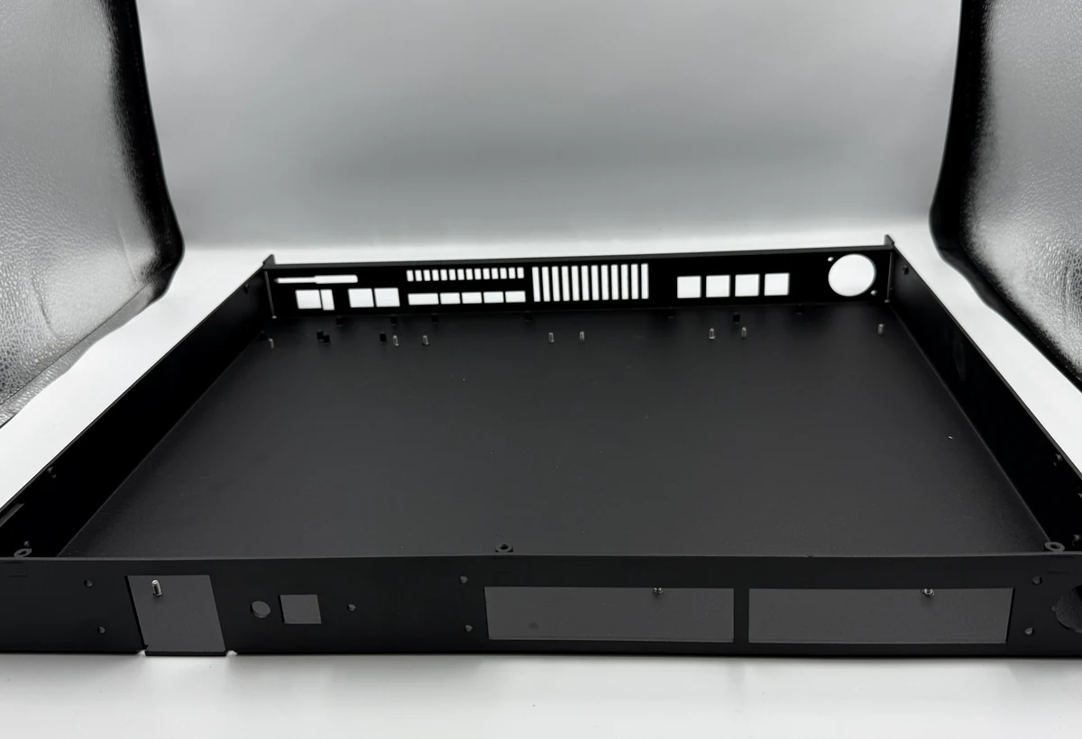Fabricated and powder-coated sheet metal chassis for professional audio electronics